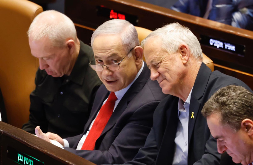  Prime Minister Benjamin Netanyahu and MK Benny Gantz at the Knesset plenum, March 13, 2024 (credit: MARC ISRAEL SELLEM)