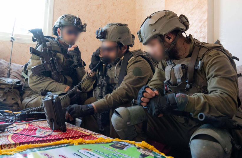   IDF troops operate in the Gaza Strip. March 14, 2024. (credit: IDF SPOKESPERSON'S UNIT)