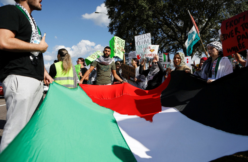  People attend a rally calling for a cease fire in Gaza, amid the ongoing conflict between Israel and Hamas, in Tampa, Florida, U.S., October 21, 2023. (credit: OCTAVIO JONES/REUTERS)