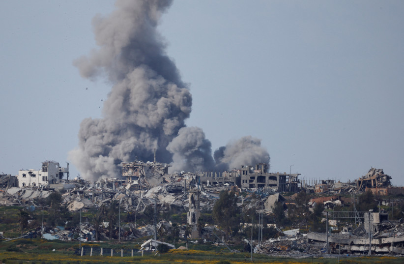  Smoke rises after an explosion in Gaza, as seen from Israel, March 14, 2024 (credit: REUTERS/AMIR COHEN)