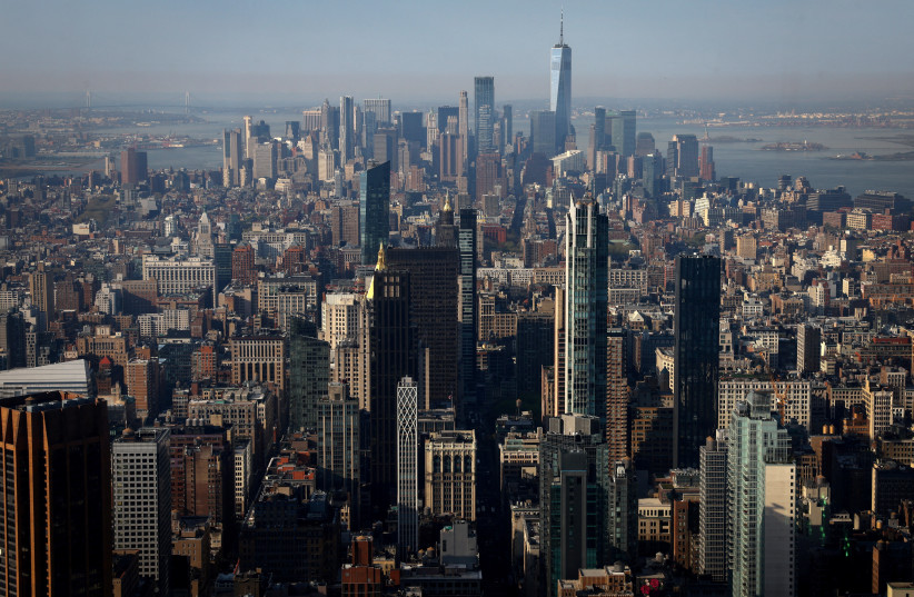  The Manhattan skyline is pictured from the Summit at One Vanderbilt observatory in Manhattan in New York City, U.S., April 14, 2023.  (credit: MIKE SEGAR / REUTERS)