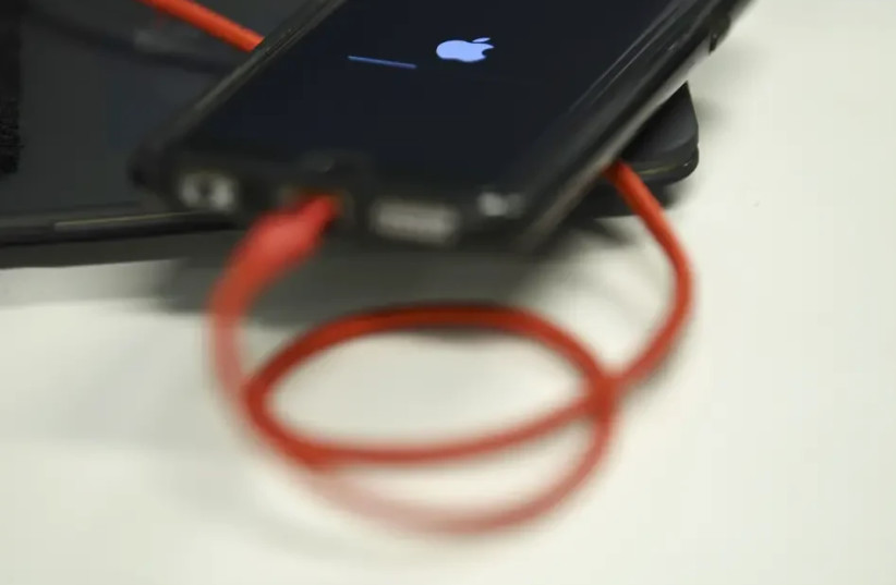  An iPhone being charged (credit: GETTY IMAGES)