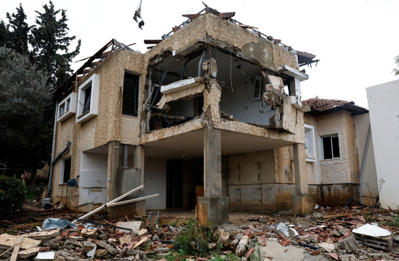 The exterior of a house damaged by a rocket fired by Hezbollah in Lebanon, amid ongoing cross-border hostilities between Hezbollah and Israeli forces, near Israel’s border with Lebanon in northern Israel. March 19, 2024. (credit: CARLOS GARCIA RAWLINS/REUTERS)