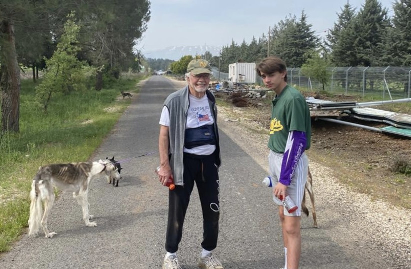  Stan Fischler is seen with his grandson Ariel. (credit: Courtesy Stan Fischler)
