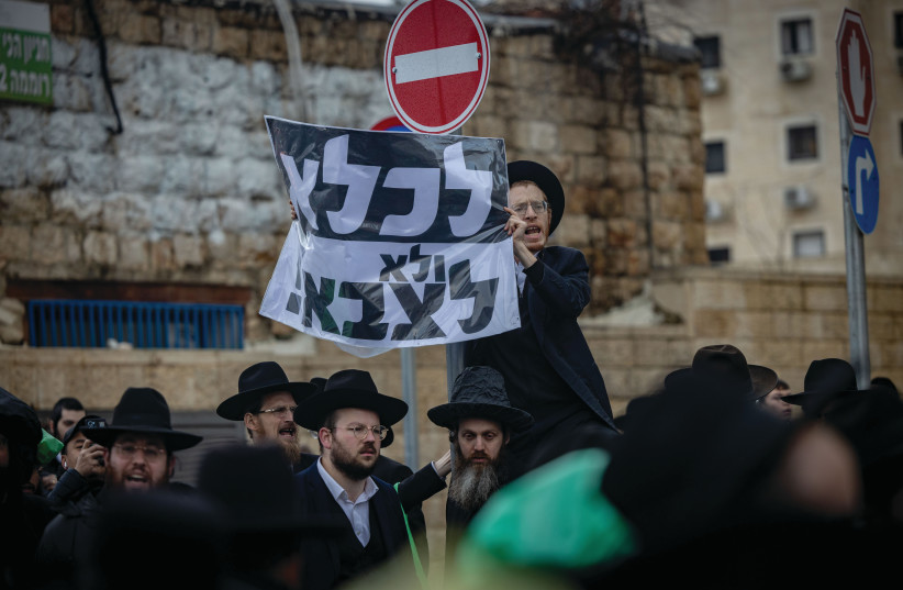  ULTRA-ORTHODOX men protest against the haredi draft, in Jerusalem last week. (credit: YONATAN SINDEL/FLASH90)