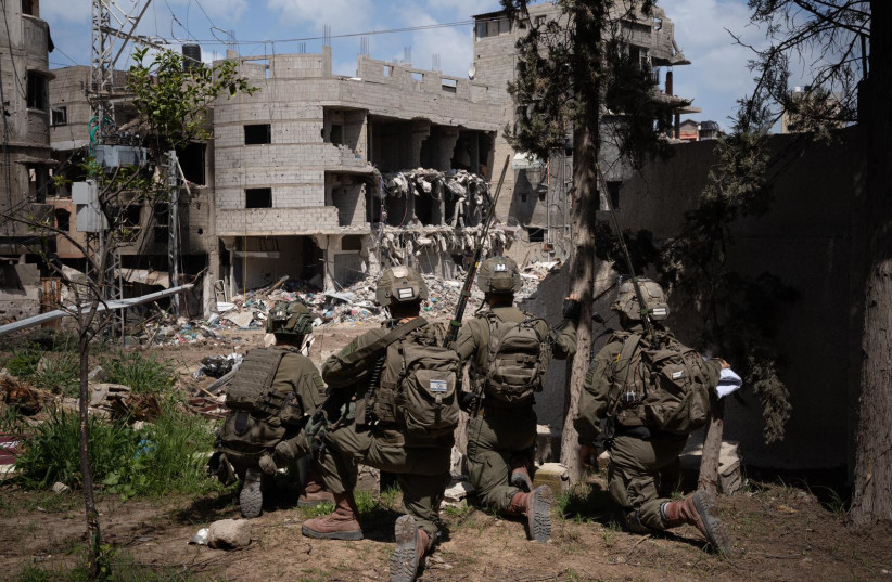   IDF troops operate in the Gaza Strip. March 23, 2024.  (credit: IDF SPOKESPERSON'S UNIT)