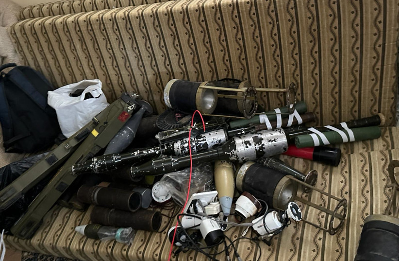  IDF finds weapons in residence in the Gaza Strip. March 23, 2024. (credit: IDF SPOKESPERSON'S UNIT)