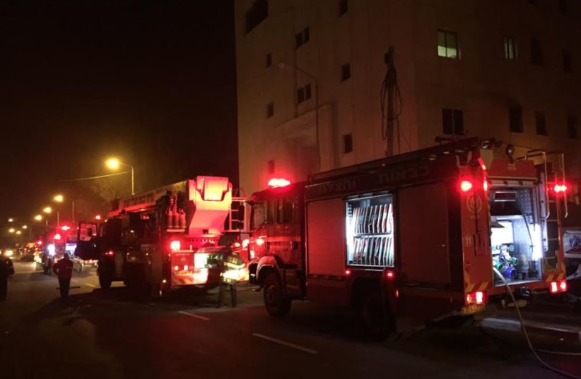   Incendio en el edificio de B'Tselem Jerusalén, 10 de enero de 2016. (credit: BERNARD BOUHADANA)