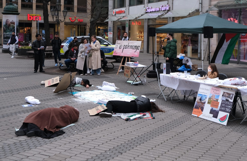  Pro-Palestinian activists attend the Palemanya protest group’s “Die-In” in downtown Nürnberg, Germany, March 15, 2024. (credit: Aaron Poris/The Media Line)