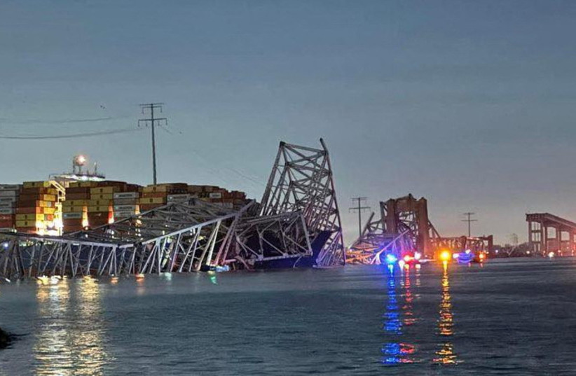  A view of the Singapore-flagged container ship 'Dali' after it collided with a pillar of the Francis Scott Key Bridge in Baltimore, Maryland, U.S., in this picture released on March 26, 2024. (credit:  Harford County MD Fire & EMS/Handout via REUTERS )