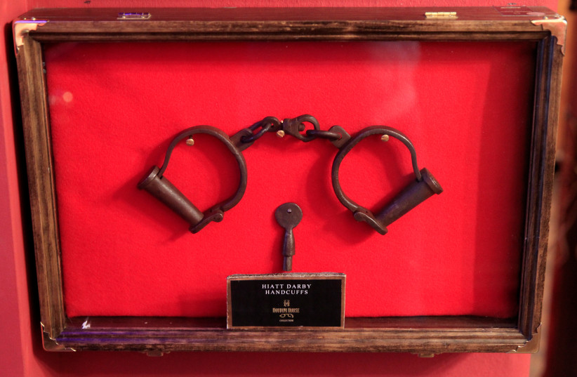   A pair of handcuffs is seen in the ''House of Houdini'' museum in Budapest, Hungary, December 19, 2016. Picture taken December 19, 2016. (credit: REUTERS/BERNADETT SZABO)