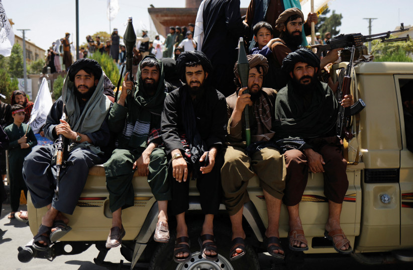  Taliban members on the second anniversary of the fall of Kabul, near the US embassy in the Afghan capital, Aug. 15, 2023 (credit: ALI KHARA/REUTERS)