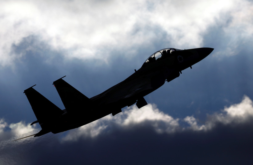  An Israeli Air Force F-15 fighter jet flies during an aerial demonstration at a graduation ceremony for Israeli air force pilots at the Hatzerim air base in southern Israel December 29, 2016. (credit: AMIR COHEN/REUTERS)