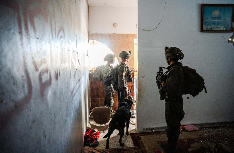 IDF troops operating in the Al Amal neighborhood in Khan Yunis, March 30, 2024. (credit: IDF SPOKESPERSON UNIT)