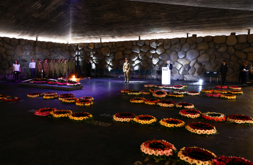  A general view during a wreath-laying ceremony marking Holocaust Remembrance Day in the Hall of Remembrance at Yad Vashem, the World Holocaust Remembrance Centre, in Jerusalem, April 18, 2023. (credit: RONEN ZVULUN/REUTERS)