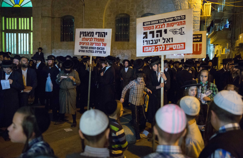  Dozens of Ultra orthodox Jews attend a protest at Mea Shearim neighborhood in Jerusalem. against compulsory military service to the Haredi (ultra orthodox) community. August 25, 2015.  (credit: FLASH90)