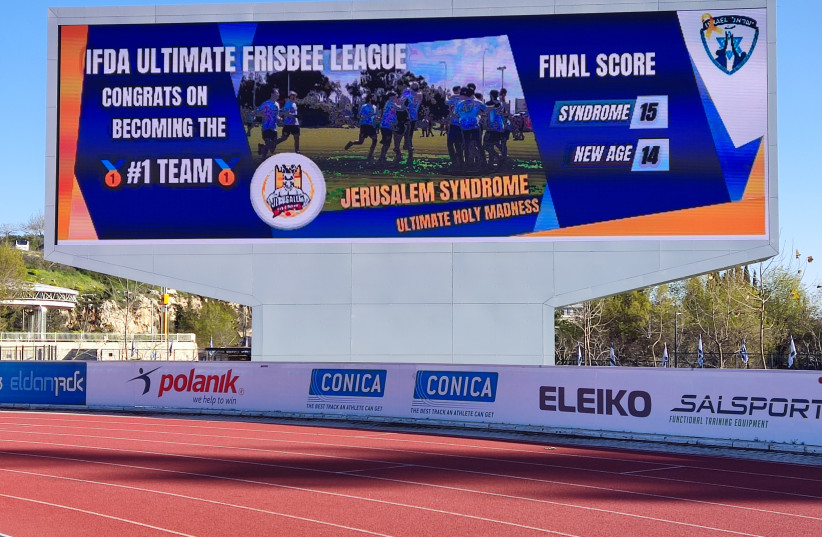  The HU Givat Ram Stadium management projected this graphic on the large scoreboard overlooking Jerusalem Syndrome’s home field to celebrate with the team on its win over New Age. ‘Some of us didn’t believe it and thought it was photoshopped,’ the writer says.  (credit: Ehud Dahan & Jonathan Jung)