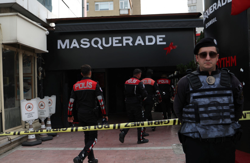 Police officers arrive the scene after a fire broke out aat a nightclub in Istanbul, Turkey April 2, 2024 (credit: REUTERS/MURAD SEZER)