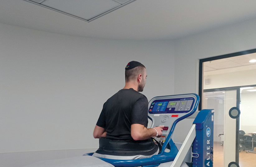  Wounded IDF soldiers use an anti-gravity treadmill to regain function. (credit: COURTESY HADASSAH)