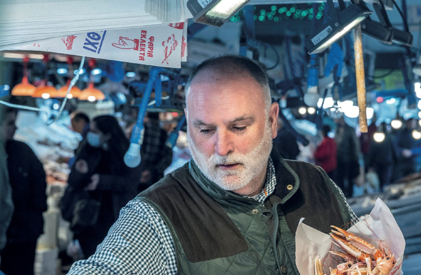  Chef Jose Andres shops at the Athens Central Market in Athens, Greece, in this undated handout image. (credit: Thomas Schauer/Handout via REUTERS)