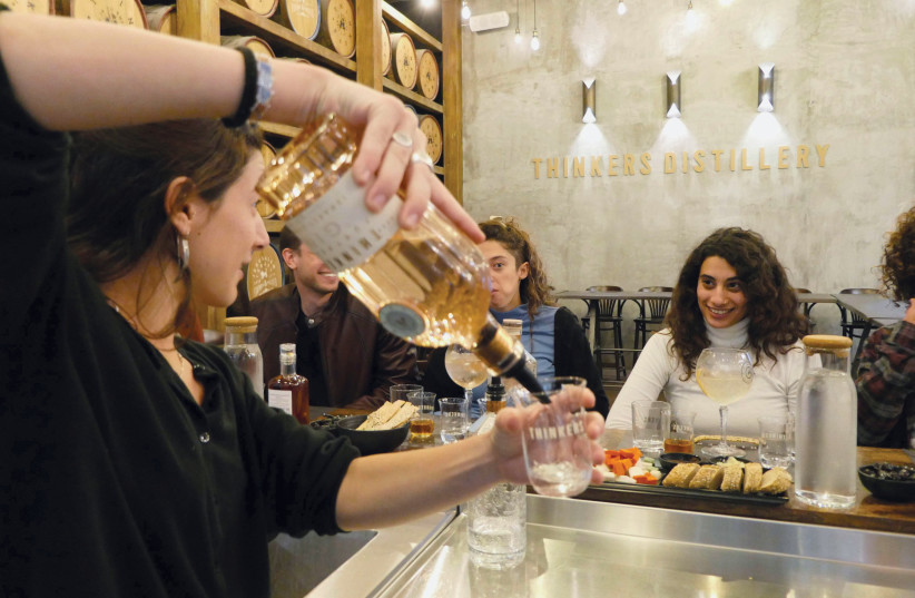  THINKERS DISTILLERY IS a fun place to meet, talk, taste, and snack with friends. (credit: Thinkers Distillery)