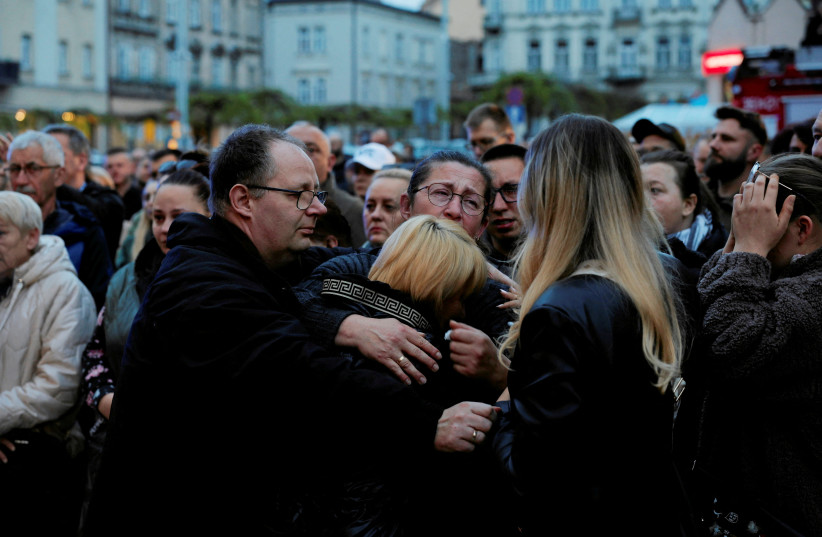  Mourners gather to hold a vigil for the Polish aid worker Damian Sobol who was killed by the Israeli army in Gaza, among seven people working for the charity World Central Kitchen (WCK) who were killed in an Israeli airstrike, in Przemysl, Poland, April 4, 2024. (credit: Patryk Ogorzalek/ Agencja Wyborcza.pl via REUTERS)