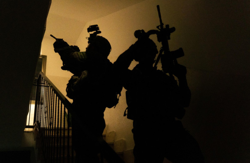  IDF troops operate in the West Bank during an overnight operation. April 8, 2024. (credit: IDF SPOKESPERSON'S UNIT)