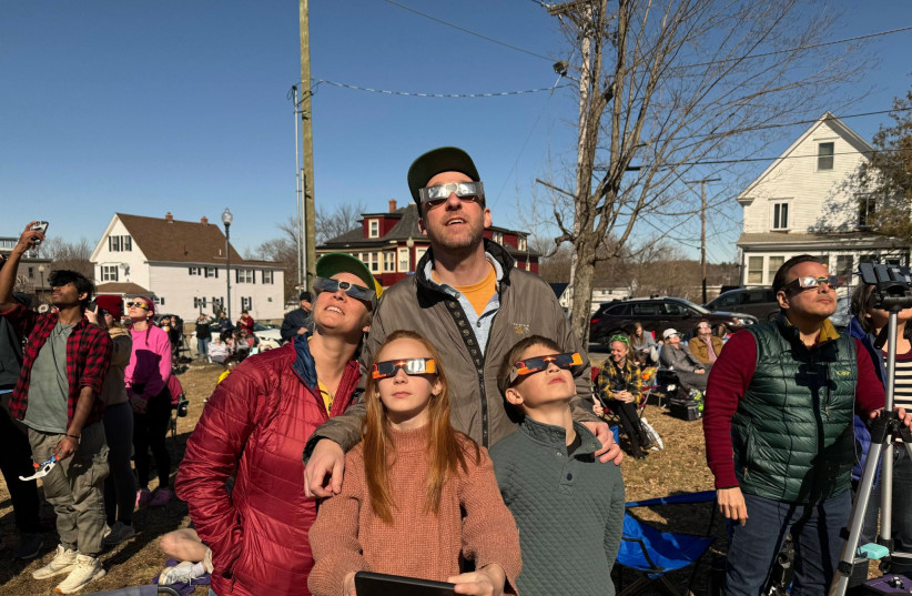  THE CLUCHEY FAMILY views the 'path of totality' in Millinocket, Maine on Monday, April 8, 2024. (credit: Rose Cluchey)