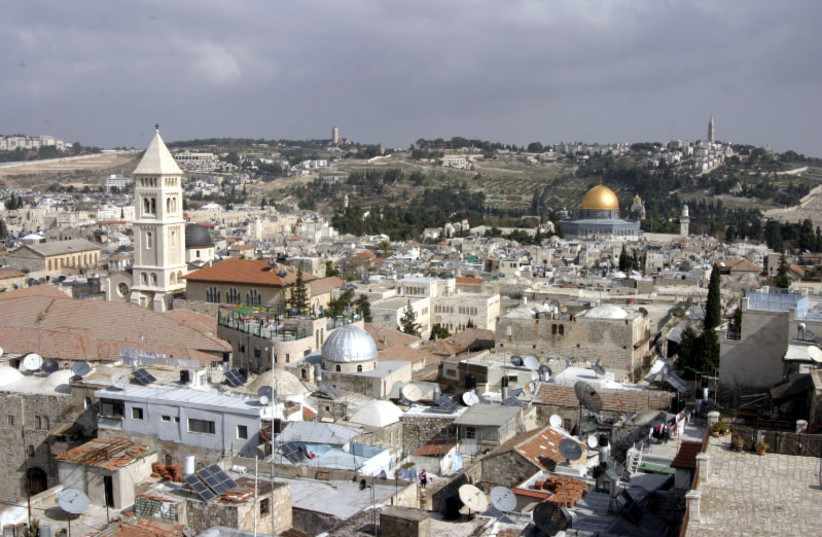  The Old City in Jerusalem with Mount Scopus and the Mount of Olives. (31/01/2004) (credit: WIKIMEDIA COMMONS/SHMUEL SPIEGELMAN)