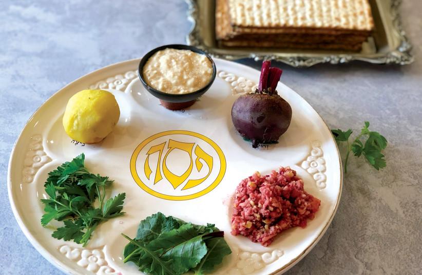  Passover Seder plate with alternative fillings. (credit: NAVA ATLAS)