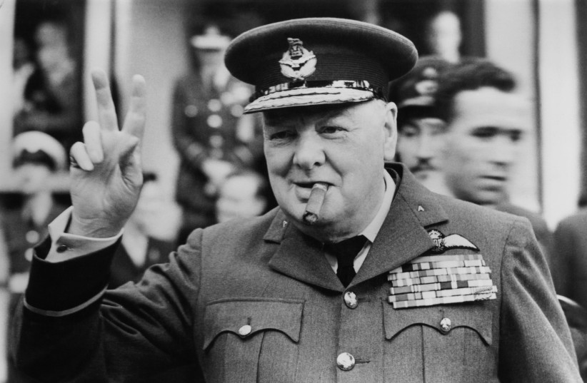  Winston Churchill gives his famous V sign, 1948. (credit: CENTRAL PRESS/HULTON ARCHIVE/GETTY IMAGES)