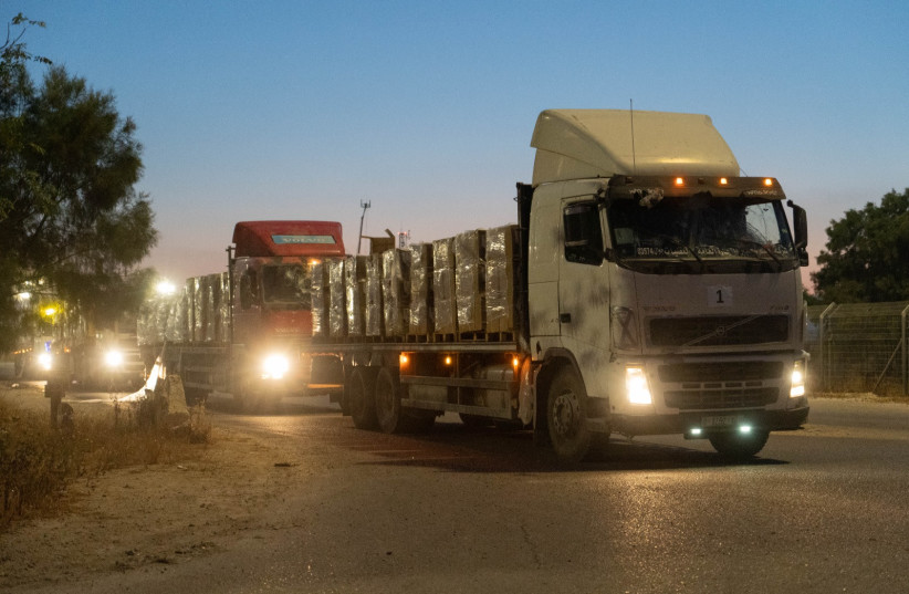  IDF humanitarian aid trucks enter through the Northern crossing of Israel in to Gaza on April 12, 2024 (credit: IDF SPOKESMAN’S UNIT)
