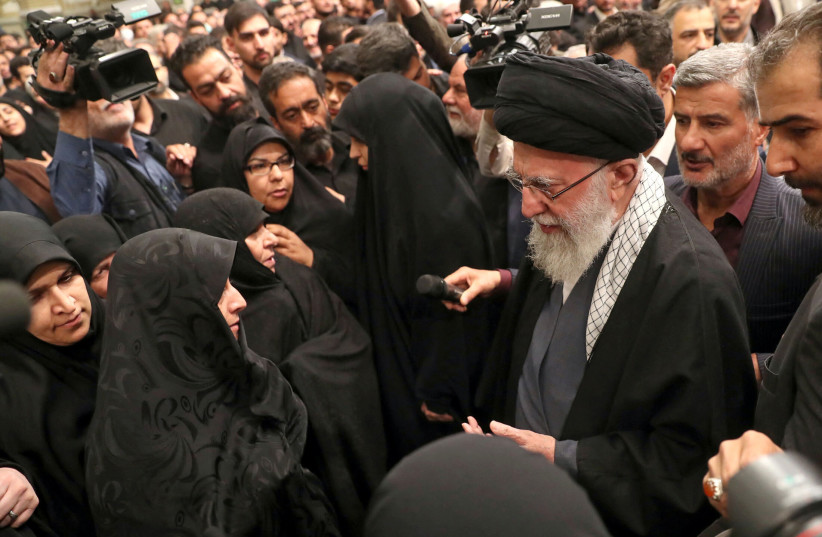  Iran's Supreme Leader, Ayatollah Ali Khamenei, meets with the family of one of the members of the Islamic Revolutionary Guard Corps who were killed in the Israeli airstrike on the Iranian embassy complex in the Syrian capital Damascus, during a funeral ceremony in Tehran, Iran April 4, 2024. (credit: Office of the Iranian Supreme Leader/WANA (West Asia News Agency)/Handout via REUTERS)