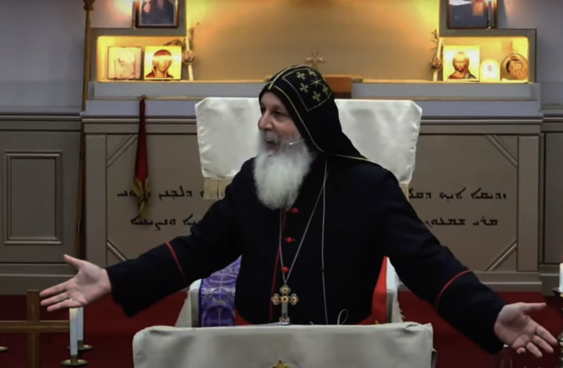 Bishop Mar Mari Emmanuel gestures during a sermon, in this screenshot from a video on YouTube. (credit: SCREENSHOT / https://tinyurl.com/4vhn64k6)