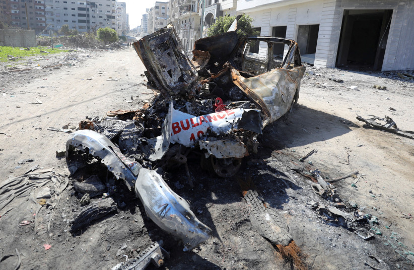 Wreckage of an ambulance used by two workers who were killed while they went to save Palestinian girl Hind Rajab, 6, who begged Gaza rescuers to send help while being trapped by Israeli military fire, after Hind’s body was found in a car along with the bodies of five of her family members, amid the  (credit: STRINGER/ REUTERS)