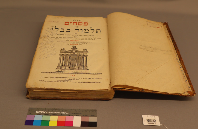 Babylonian Talmud that survived the Holocaust gifted to Yad Vashem by President Herzog, April 17, 2024. (credit: YAD VASHEM)