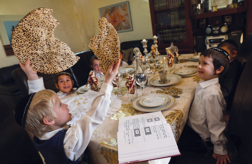  YACHATZ: AT the end of the Seder, that broken matzah will symbolically be made whole again. (credit: NATI SHOHAT/FLASH90)