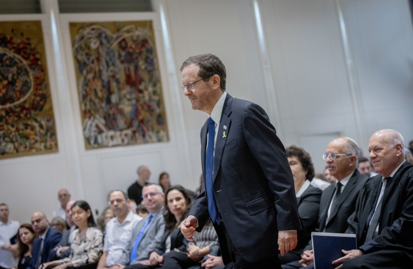  Israeli president Isaac Herzog speaks at a swearing in ceremony for newly appointed judges at the President's residence in Jerusalem, on April 18, 2024. (credit: Chaim Goldberg/Flash90)