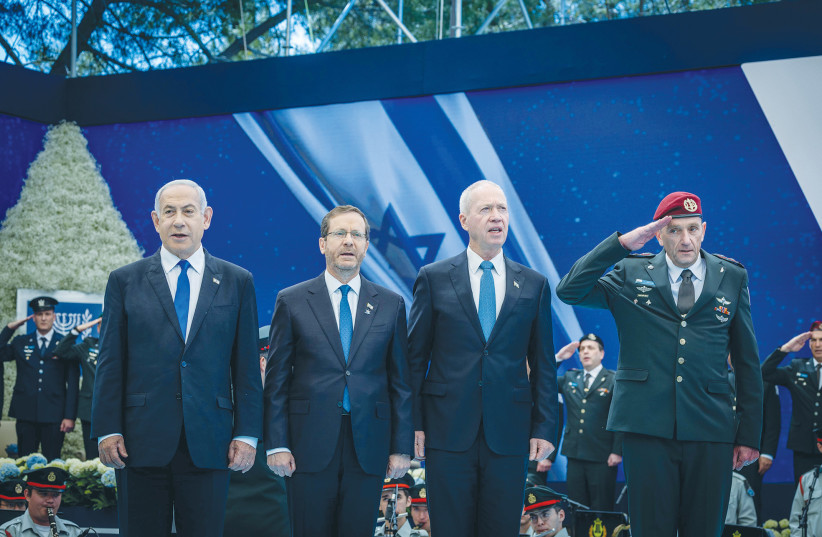  PRIME MINISTER Benjamin Netanyahu, President Isaac Herzog, Defense Minister Yoav Gallant, and IDF Chief of Staff Lt.-Gen. Herzi Halevi attend an event honoring outstanding soldiers at the President’s Residence in Jerusalem, on Independence Day last year.  (credit: YONATAN SINDEL/FLASH90)