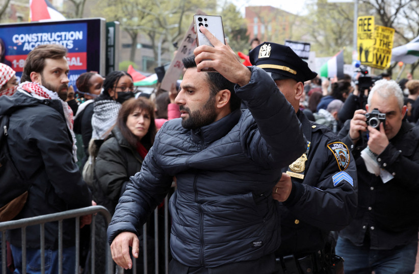  Israeli Arab activist Yoseph Haddad shortly after being physically assaulted by a pro-Palestinian demonstrator at a protest near the Columbia University on Thursday, April 18, 2024. (credit: REUTERS/CAITLIN OCHS)