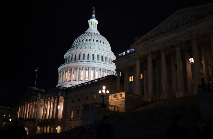  The US Capitol is seen during a Senate vote to begin work on a bill that includes aid for Ukraine, Israel and Taiwan in Washington, US, February 9, 2024.  (credit: REUTERS/Nathan Howard)