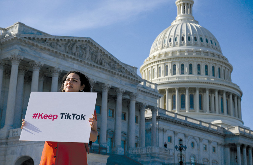  Giovanna Gonzalez of Chicago demonstrates on Capitol Hill following a press conference by TikTok creators to voice their opposition to the Protecting Americans from Foreign Adversary Controlled Applications Act on March 12.  (credit: Craig Hudson/Reuters)