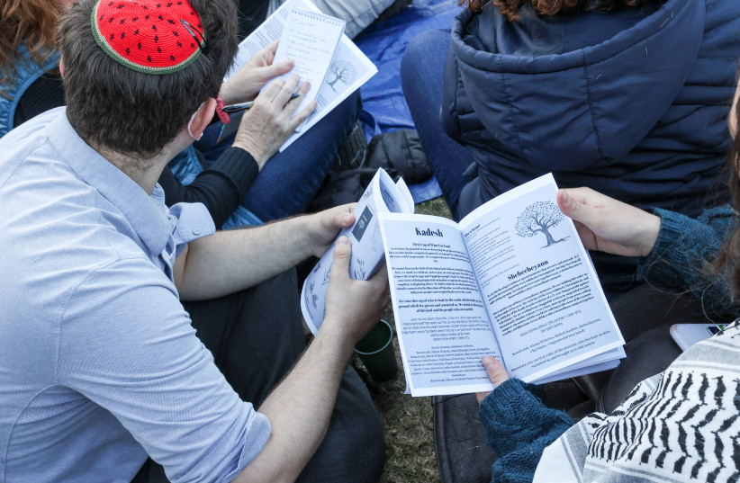 A collective of groups organised by Jewish students at Columbia and Barnard in solidarity with Gaza and the protest encampment host Passover Seder at Columbia University, during the ongoing conflict between Israel and the Palestinian Islamist group Hamas, in New York City, U.S., April 22, 2024, (credit: CAITLIN OCHS/REUTERS)