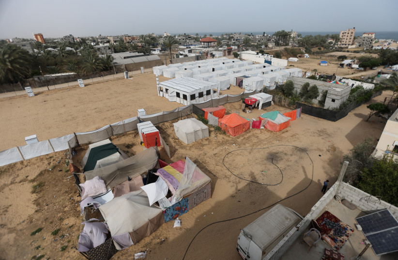  A view of tents set up for displaced Palestinians amid fears of Israeli ground offensive on Rafah, as the conflict between Israel and Hamas continues, in al-Mawasi area in Khan Younis in the southern Gaza Strip, April 25, 2024.  (credit: REUTERS/Ramadan Abed)