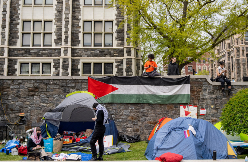  Students and pro-Palestinian supporters occupy a plaza at the City College of New York campus, during the ongoing conflict between Israel and the Palestinian Islamist group Hamas, in New York City, U.S., April 27, 2024 (credit: REUTERS/David Dee Delgado)