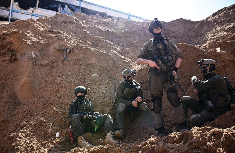  IDF SOLDIERS operate near what the military described as a Hamas command tunnel running partly under UNRWA headquarters, in the Gaza Strip, in February. In spite of the remarkable achievements of the IDF in Gaza, the war lingers on with no clear end in sight, the writer laments. (credit: DYLAN MARTINEZ/REUTERS)