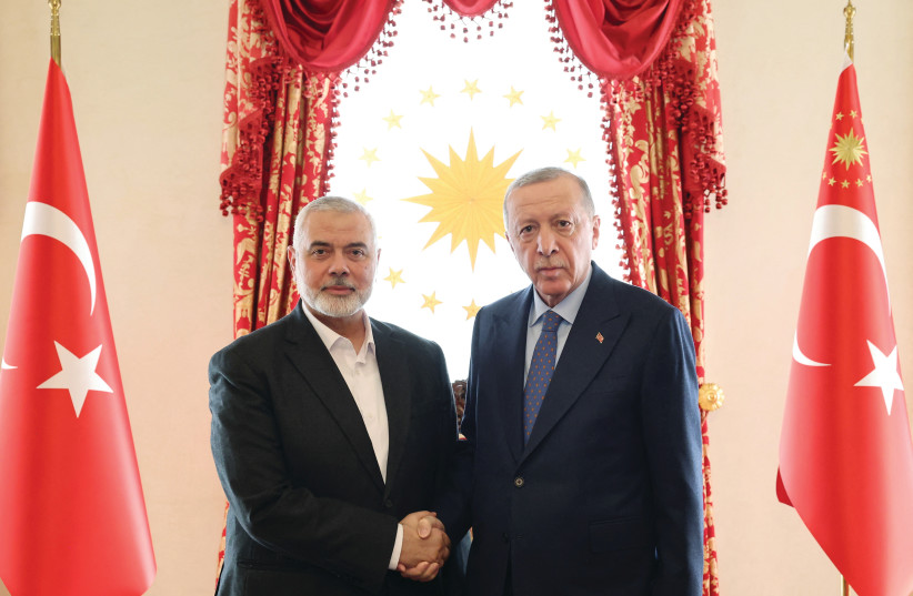  TURKEY’S PRESIDENT Recep Tayyip Erdogan meets with Hamas leader Ismail Haniyeh, in Istanbul, earlier this month. Reports in the media suggested that this meeting was the result of a breakdown in relations between Hamas and Qatar. (credit: Turkish Presidential Press Office/Reuters)
