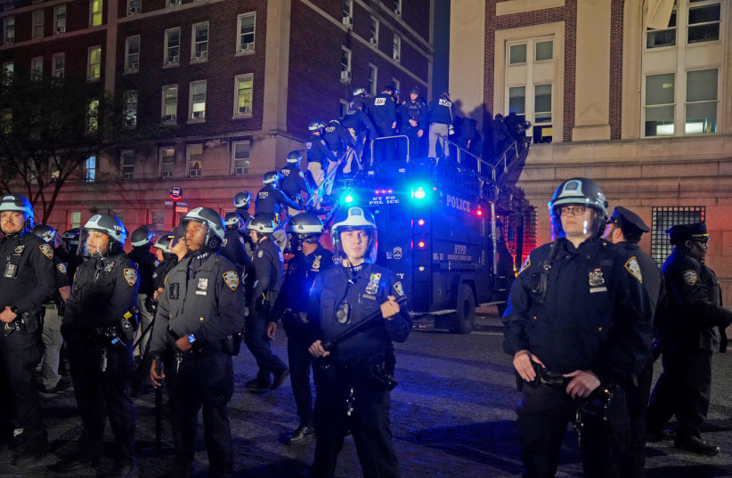  Police use a special vehicle to enter Hamilton Hall which protesters occupied, as other officers enter the campus of Columbia University, New York City, US, April 30, 2024. (credit: REUTERS/David Dee Delgado)