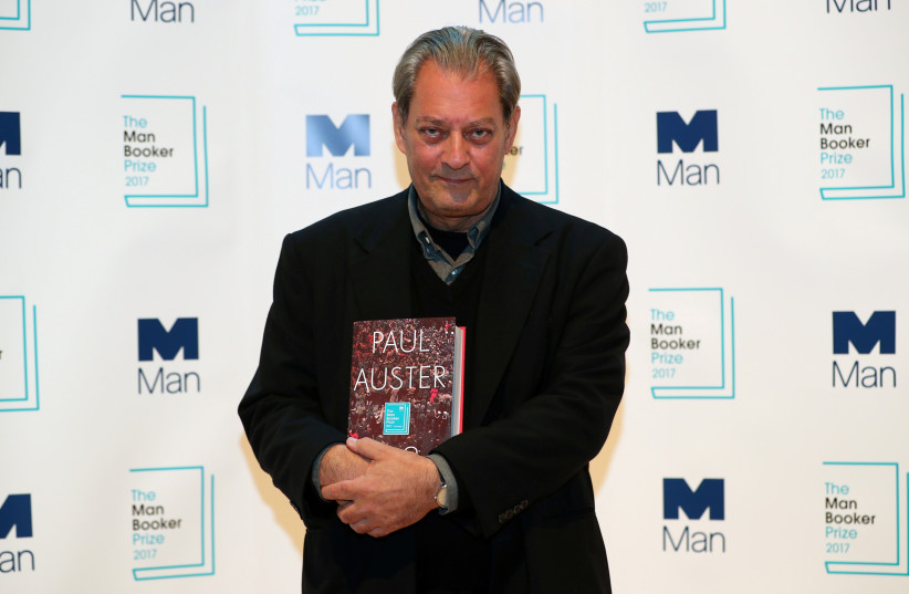  Author Paul Auster poses for photographs during a photo-call in London for the six Man Booker shortlisted fiction authors, on the eve of the prize giving in London, Britain October 16, 2017. (credit: Hannah McKay/Reuters)