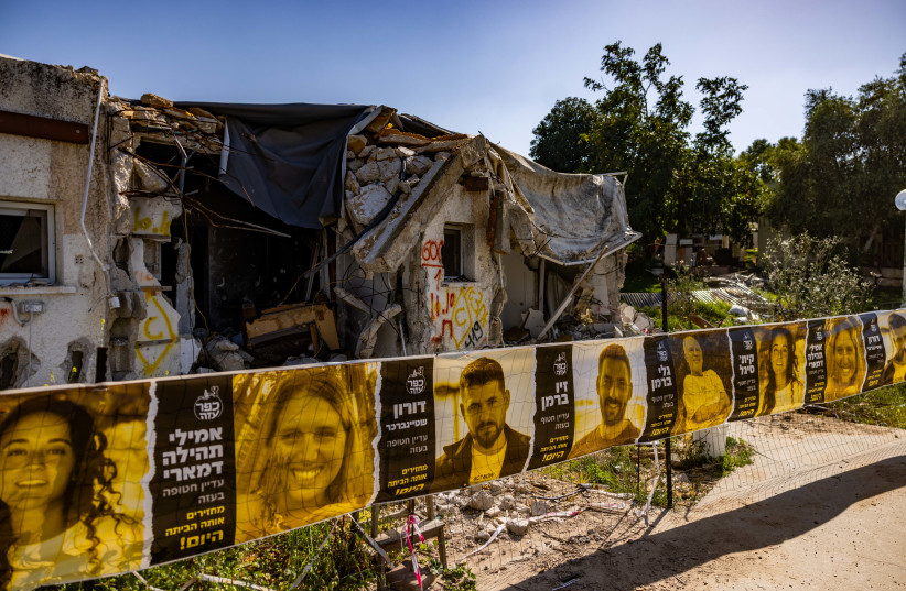  destroyed houses from the October 7 massacre six months ago, in Kibbutz Kfar Aza, southern Israel, April 7, 2024 (credit: Chaim Goldberg/Flash90)
